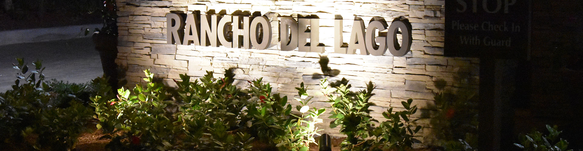 commercial-header photo of rancho del lago monument lighted sign